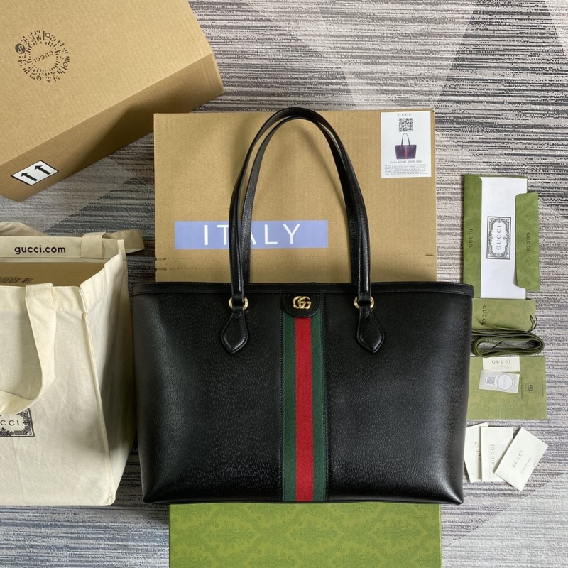 G*u*i shopping bags